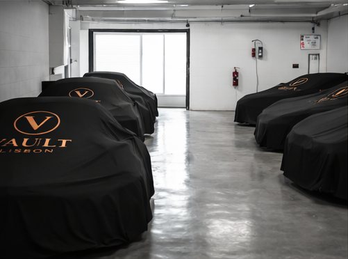 Covered vehicles along the storage aisle