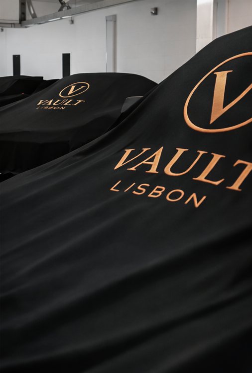 The Vault Lisbon emblem on a car cover